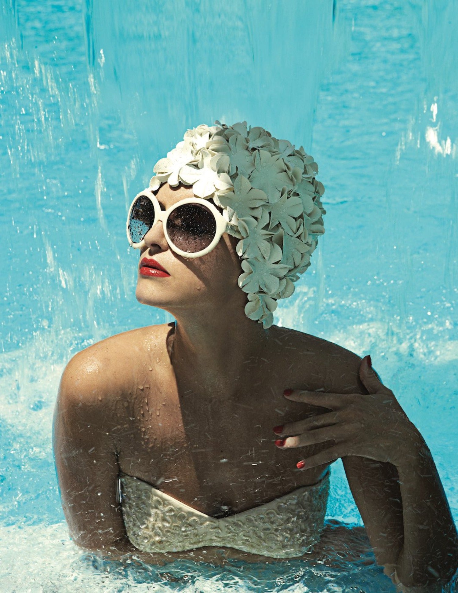 glamorous woman in white swim cap with red lips fashion photography